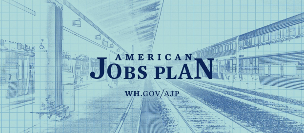 EinBlueprint einer Bahnstation mit den Worten "American Jobs Plan" darauf, das einen Zug auf der rechten Seite und Bahnschienen daneben zeigt.