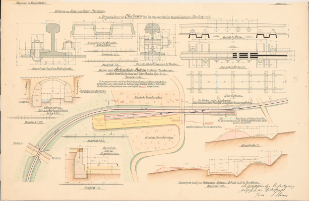Ein detailliertes Bild eines alten Buchs mit einer Zuggleis-Zeichnung und ausführlichen Eisenbahn-Layout-Notizen.