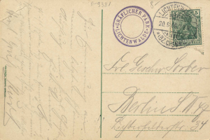 Eine alte Postkarte mit einer Briefmarke, die "Lichtenwald, Deutschland - Cover nach Deutschland" lautet und handgeschriebener Text, mit zwei zusätzlichen Stempeln in der oberen rechten Ecke.