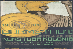Ein Plakat, das ein Konzert in Berlin im Jahr 1904 ankündigt, das eine Person in einem Helm mit einem Schild zeigt, mit 'Darmstadt' und 'Künstlerkolonie' in fetter Schrift.