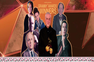 Gruppe von Menschen auf einer Bühne, die einen Preis halten und bei den Grammy Awards gewinnen.