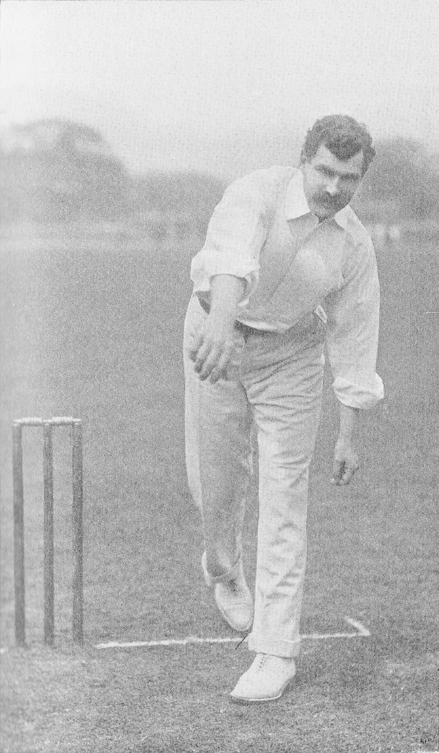 Ein Mann in weißem Hemd und Hose spielt Cricket mit Wickets auf dem Boden, Bäumen und Himmel im Hintergrund, mit "Cricket-Spieler des Jahres" Text unten.